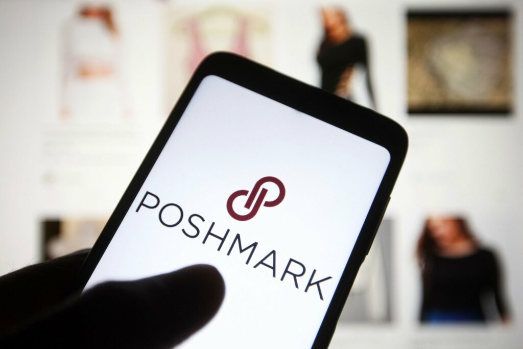 Phone displaying the poshmark logo