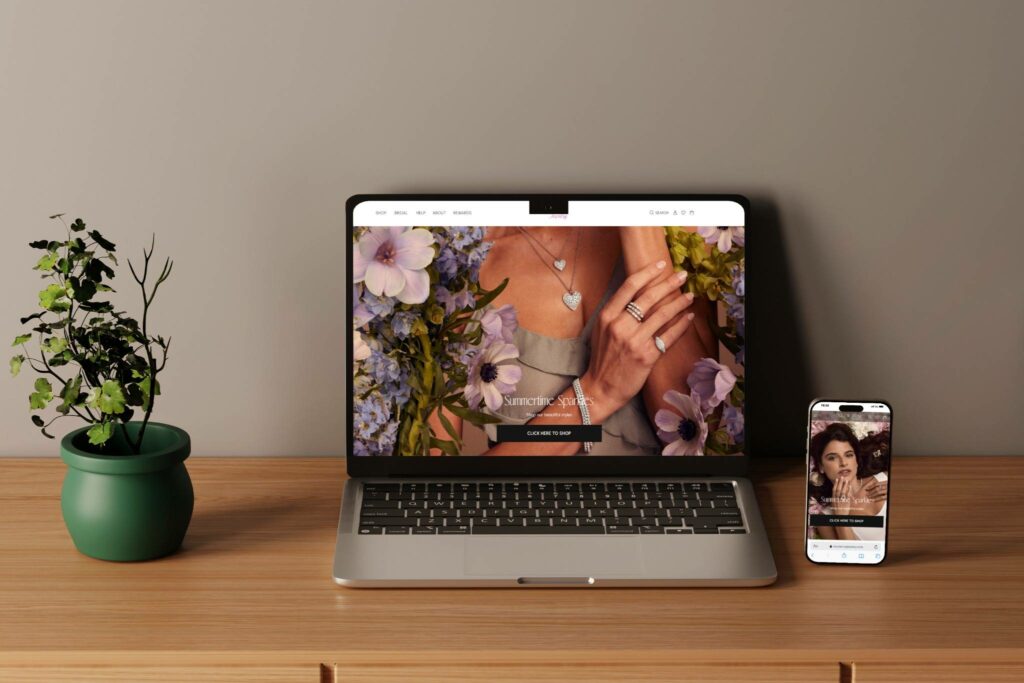 Laptop and smartphone displaying an elegant e-commerce jewelry website, representing responsive online store design by Jives Media