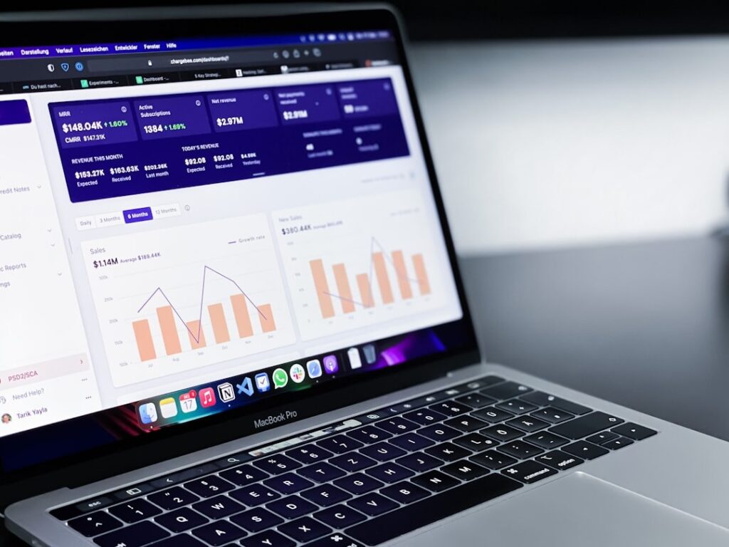Laptop displaying data at a Full-service marketing agency